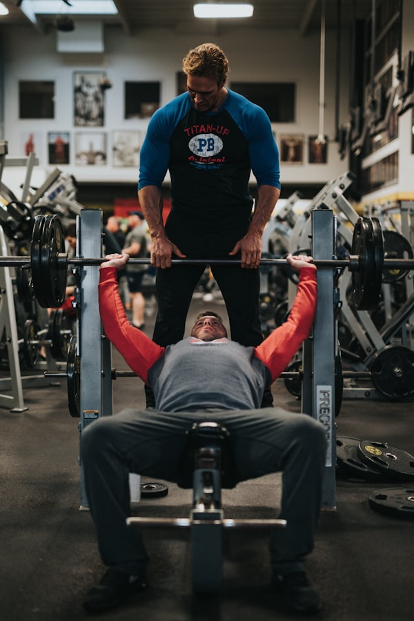 Chalk hands on barbell grip